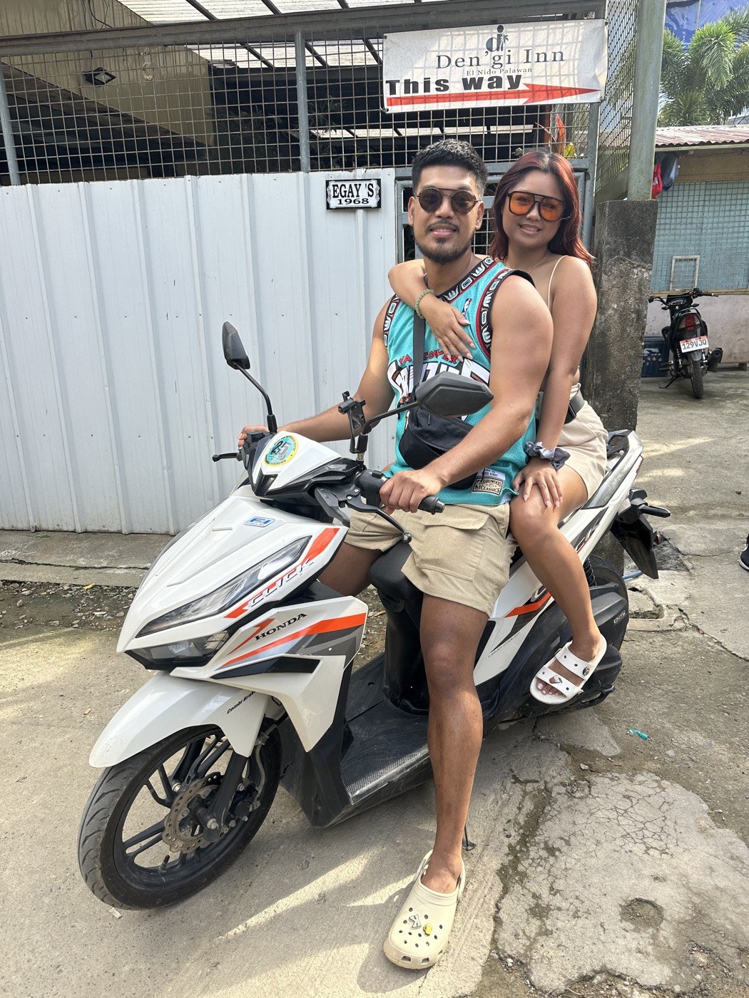 Philip and Kaitlin on a scooter